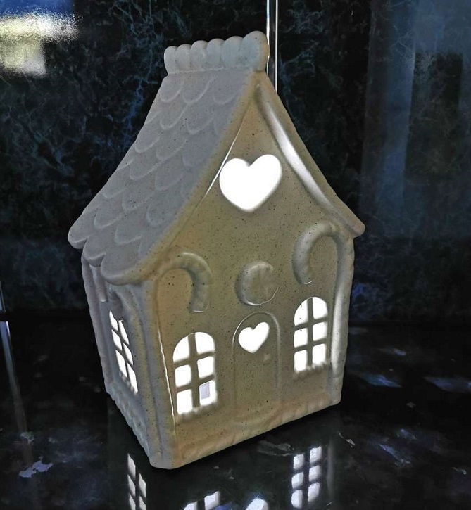 Large Gingerbread House Lantern in dark