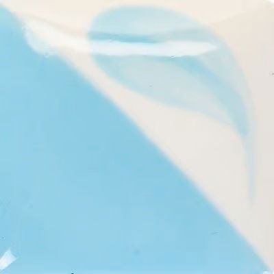 An image of a colour chip of an Aqua Blue Cromartie Colours ceramic underglaze, half blue half white.