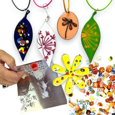 Assorted enamel jewellery made with powders, stencils, and chips