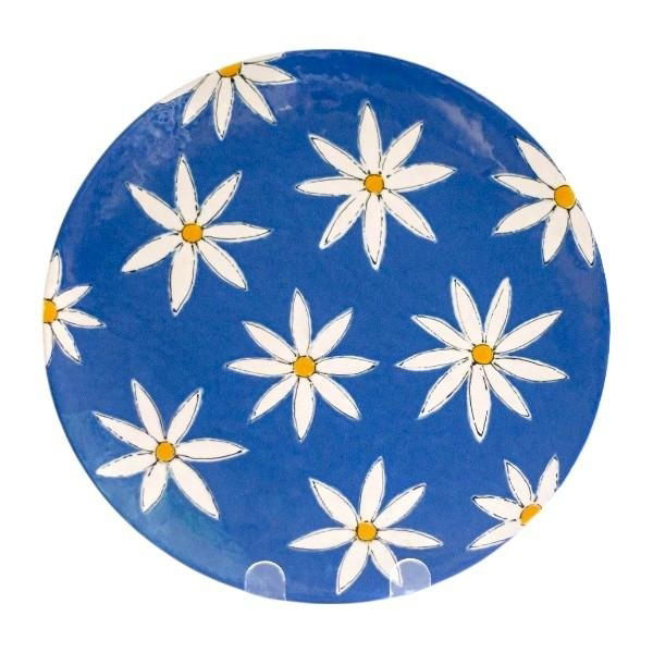 An image of a paint your own pottery plate with blue daisy design